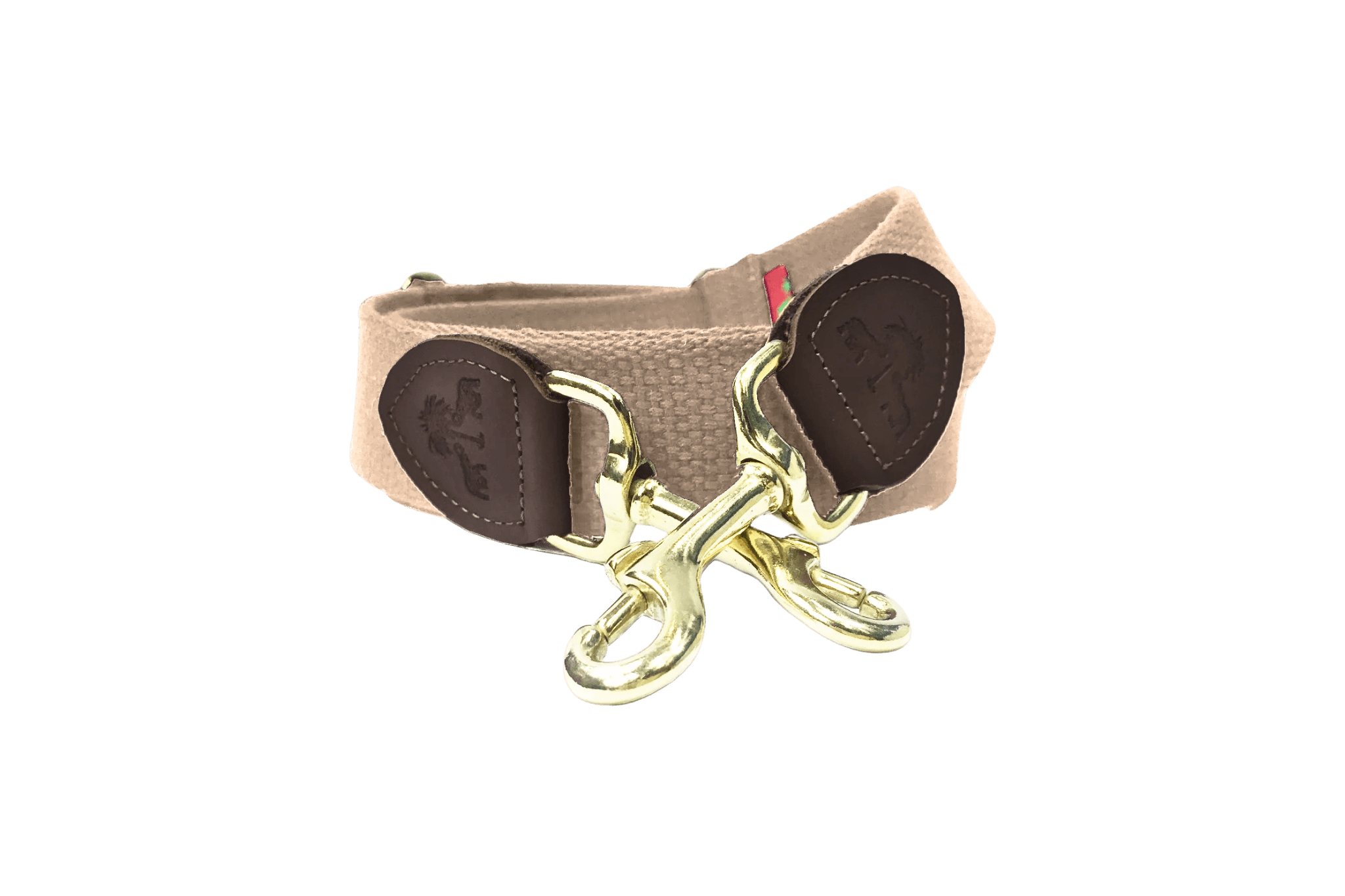 Schulterriemen für Greta's Hundetasche in Beige mit Lederdetails und goldenen Karabinern.