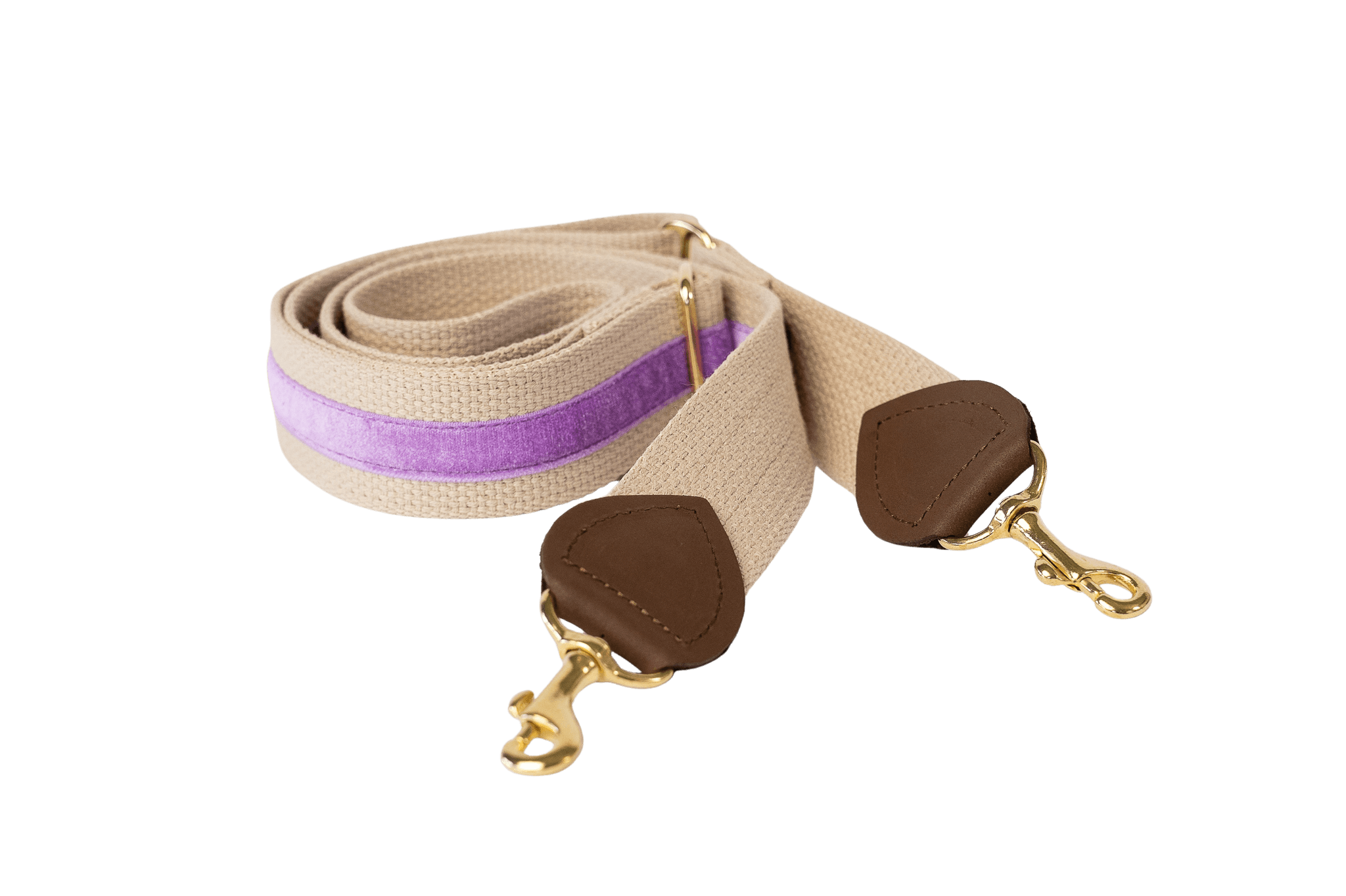 Schulterriemen in Beige mit lilafarbenem Samtstreifen für Greta's Hundetasche, mit Lederdetails und goldenen Karabinern.