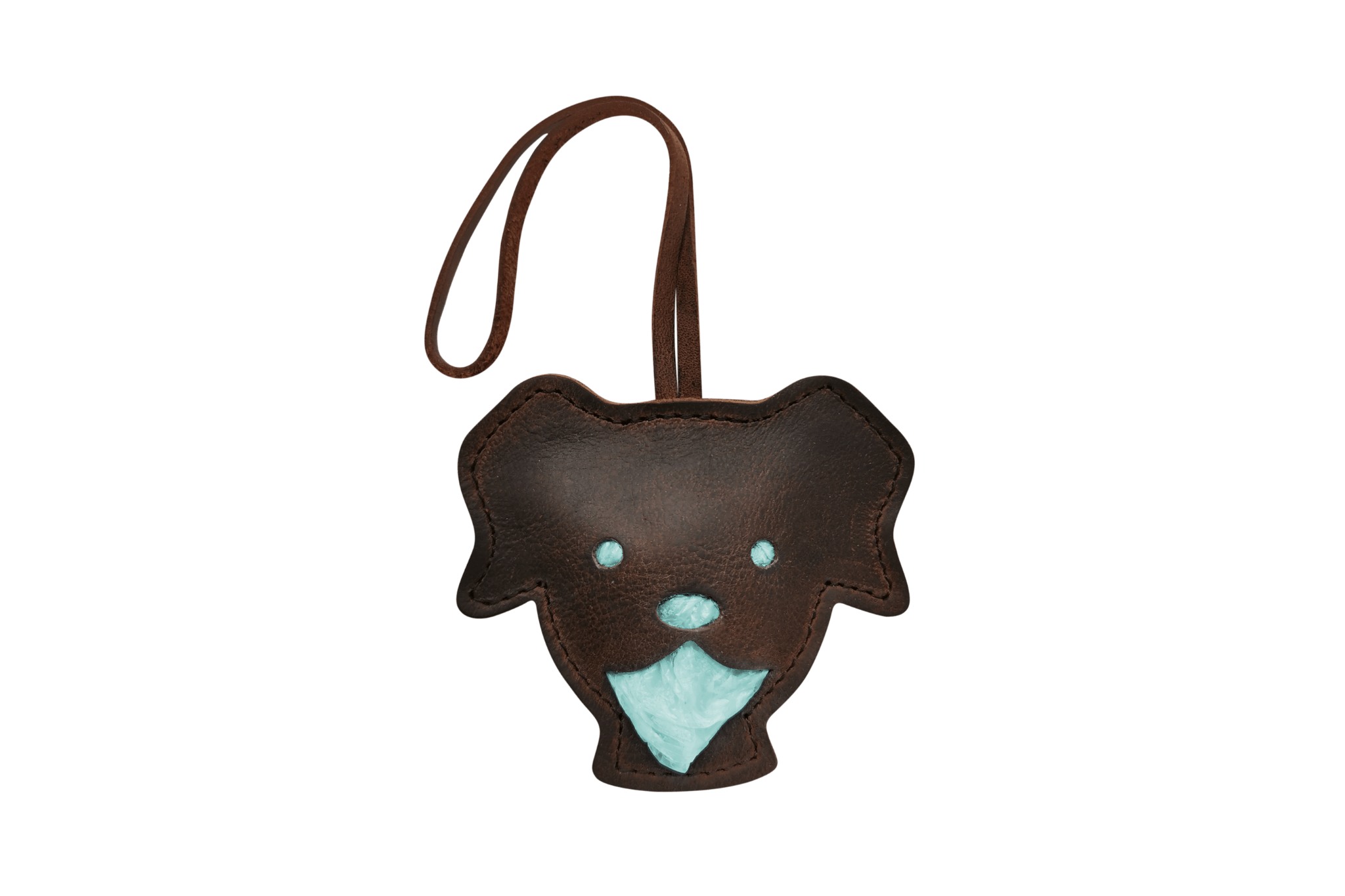 Handgefertigter Leder-Tütchenspender "Theo" in Form eines Hundekopfes, gefüllt mit türkisen Kotbeuteln.