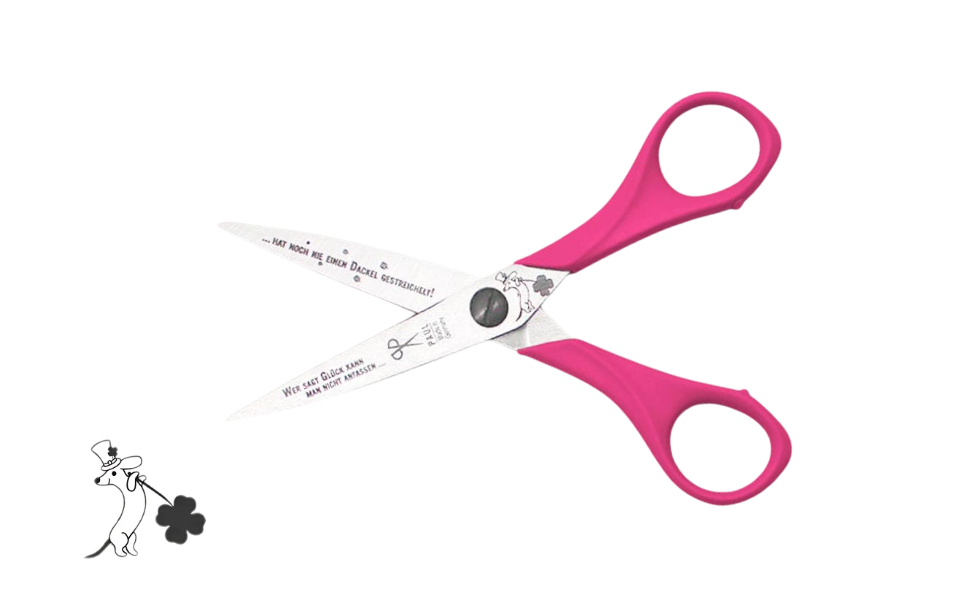 Greta's Dackel-Bastelschere von PAUL in Pink mit Gravur "Wer sagt Glück kann man nicht anfassen... hat noch nie einen Dackel gestreichelt!".
