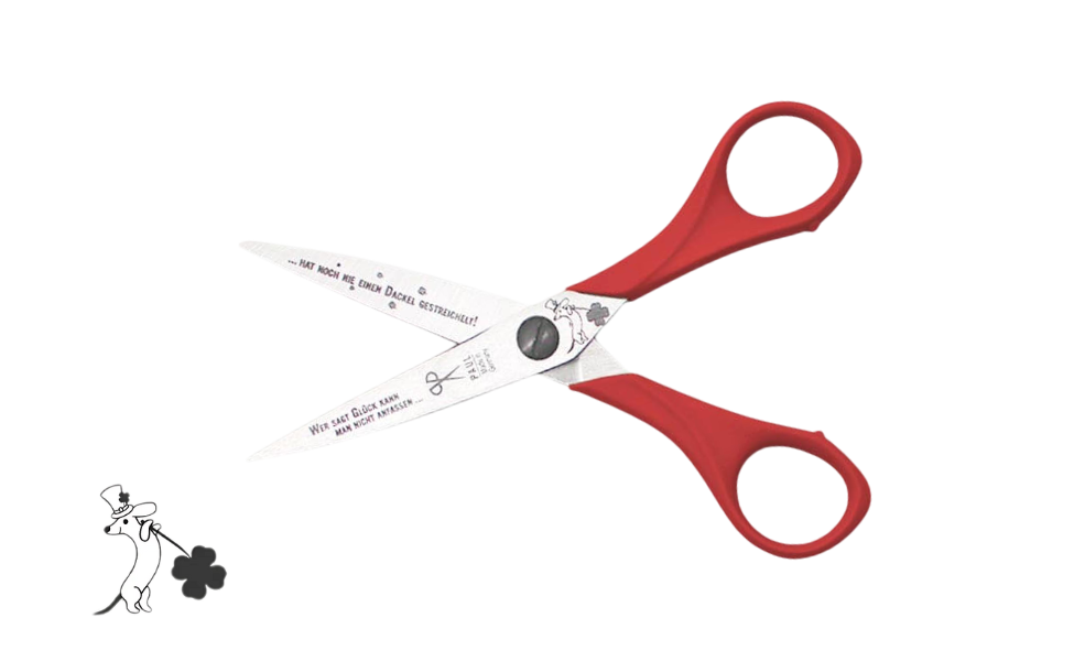 Greta's Dackel-Bastelschere von PAUL in Rot mit Gravur "Wer sagt Glück kann man nicht anfassen... hat noch nie einen Dackel gestreichelt!".
