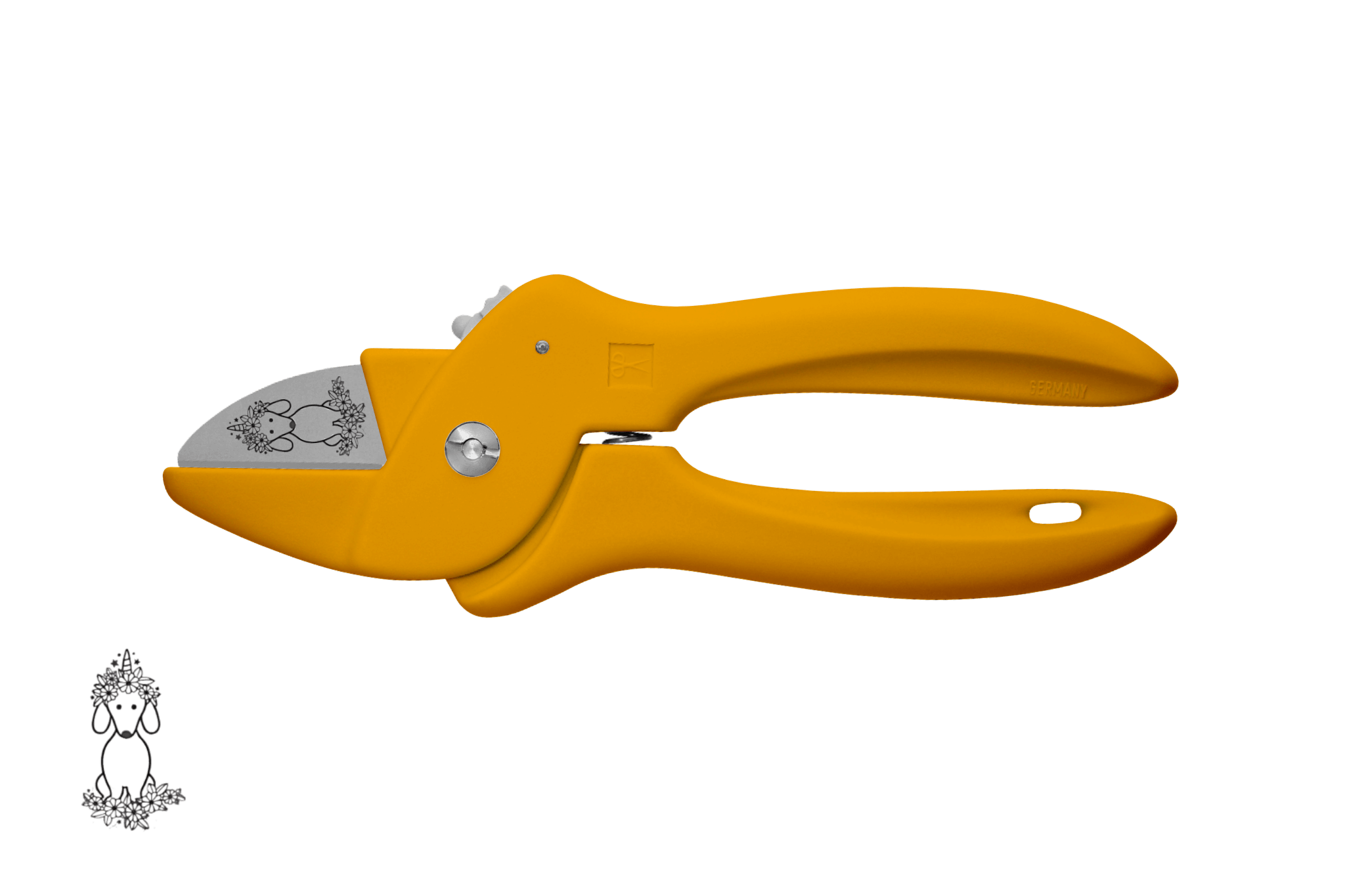 Greta's Dackel-Blumenschere von PAUL in Dunkelgelb, veredelt mit einer detailreichen Dackel-Einhorn-Gravur.

