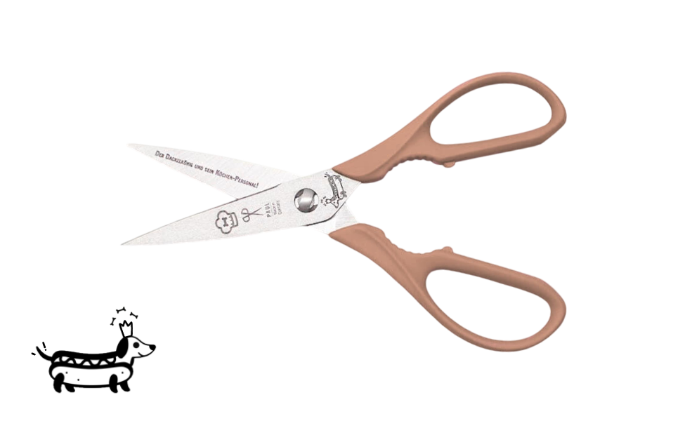 Greta's Dackel-Küchenschere von PAUL in Beige mit Aushebefunktion und Gravur "Der Dackelkönig und sein Küchen-Personal!".
