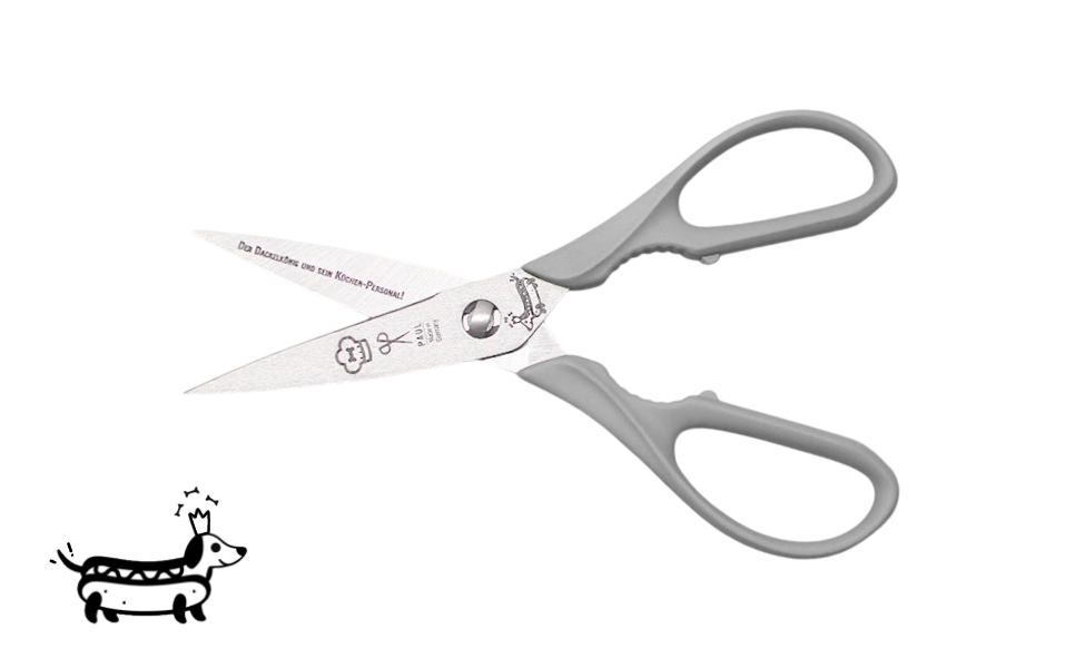Greta's Dackel-Küchenschere von PAUL in Grau mit Aushebefunktion und Gravur "Der Dackelkönig und sein Küchen-Personal!".

