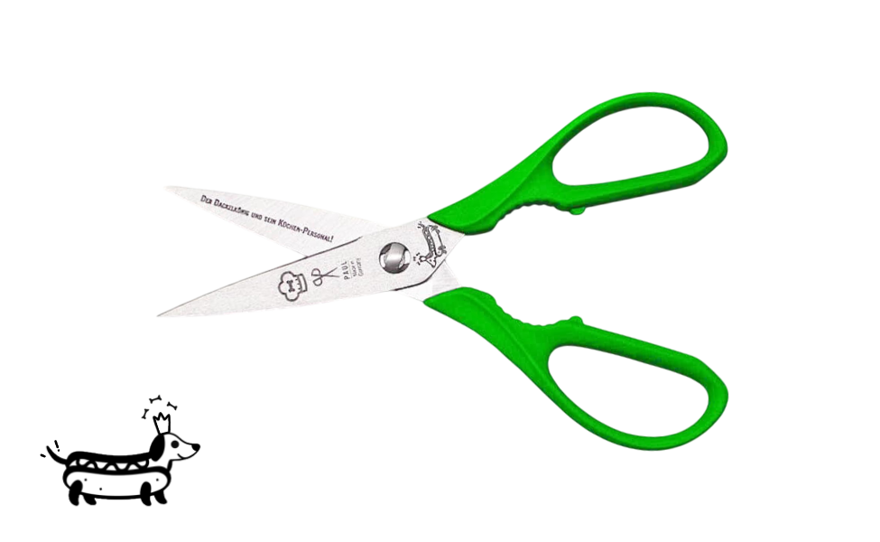 Greta's Dackel-Küchenschere von PAUL in Grün mit Aushebefunktion und Gravur "Der Dackelkönig und sein Küchen-Personal!".
