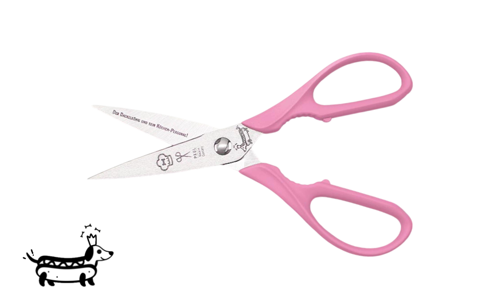 Greta's Dackel-Küchenschere von PAUL in Rosa mit Aushebefunktion und Gravur "Der Dackelkönig und sein Küchen-Personal!".

