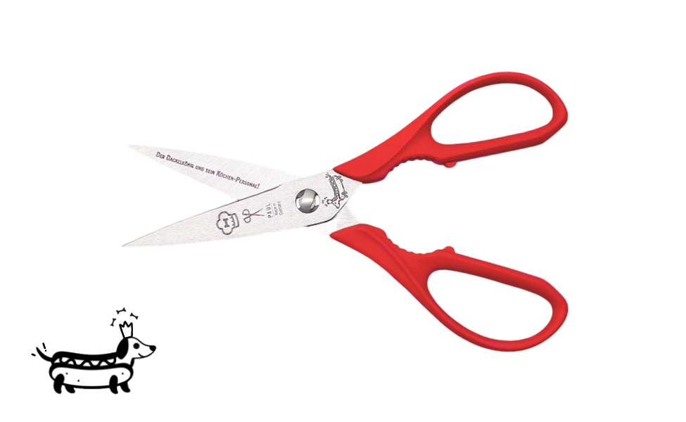 Greta's Dackel-Küchenschere von PAUL in Rot mit Aushebefunktion und Gravur "Der Dackelkönig und sein Küchen-Personal!".
