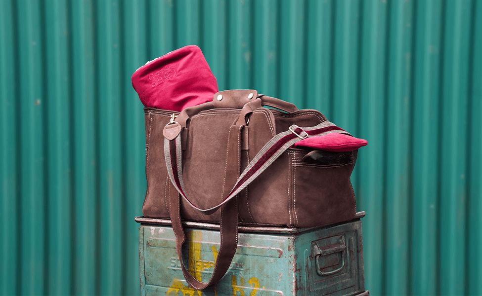 Greta's luxury suede travel and carrying bag