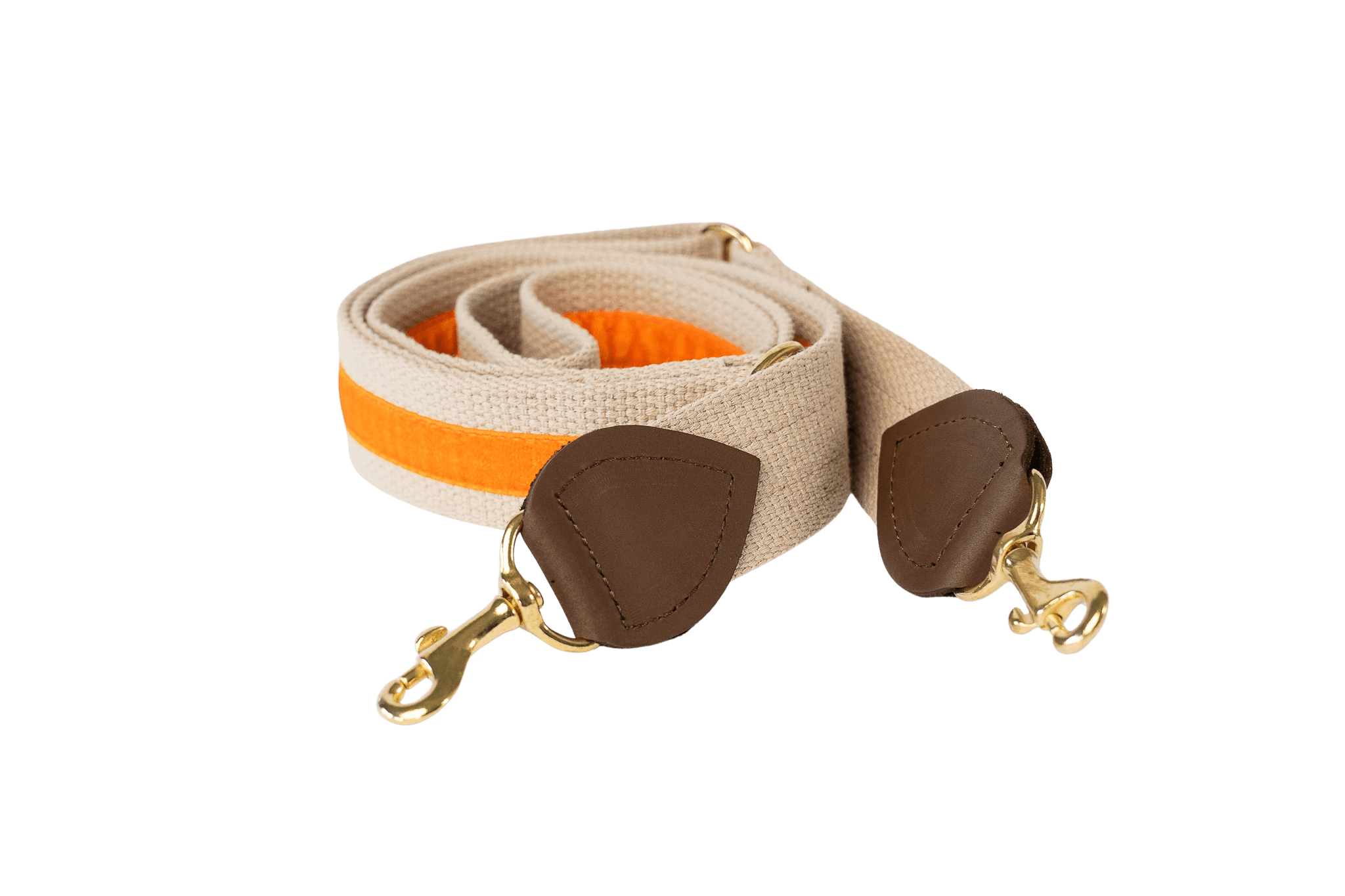 Schulterriemen in Beige mit orangefarbenem Samtstreifen für Greta's Hundetasche, mit Lederdetails und goldenen Karabinern.